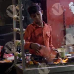 Boy Grilling Paneer Tikka with a Coal Grill - Log, Colour and B&W