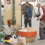 Peanut Seller on a Street - Log, Colour and B&W