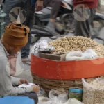 Roasted Peanut Seller in Winters - Log, Colour and B&W