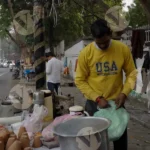 Tea Seller Igniting Stove - Log, Colour and B&W