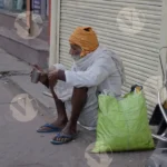 Old Man Drinking Tea on Road - Log, Colour and B&W