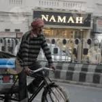 Cycle Rickshaw and a Man walking - Log, Colour and B&W