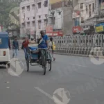 Old Man cycling a cycle Rickshaw - Log, Colour and B&W