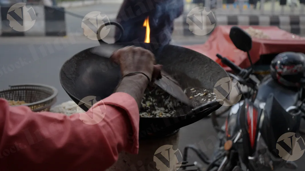 Flattened Rice Getting Roasted at a cart (Top View) - Log, Colour and B ...
