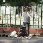 Belts and Wallet Seller on Road - Log, Colour and B&W