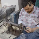 Man Sewing a Jacket (Top View) - Log, Colour and B&W