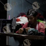 Man Sewing a Jacket in Dark - Log, Colour and B&W
