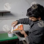 Chef Packing Dal - Log, Colour and B&W