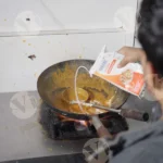 Chef Putting Cream in Sauce - Log, Colour and B&W