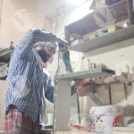 Carpenter working on a piece of wood - Log, colour and B&W