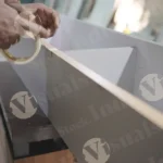 Man tapping shelf - Log, colour and B&W