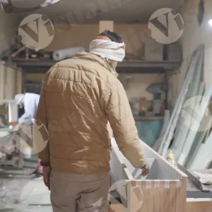 Carpenter applying glue to wood - Log, colour and B&W