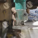 Carpenter shaping plywood - log, colour and B&W