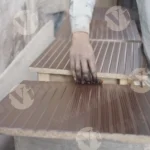 Man polishing plywood - Log, colour and B&W