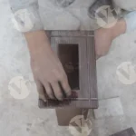 Man carving designs on wood - Log, colours and B&W