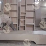 Man fixing plywood - Log, colour and B&W