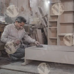 Carpenter hammering nails into plywood wide shot - Log, colour and B&W