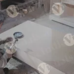 Carpenter working on plywood top shot - Log, colour and B&W