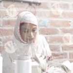 Women Sewing Febric - Log, colour and B&W