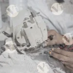 Thread is being inserted into a sewing machine - Log, colour and B&W