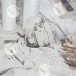 Worker sewing mop - Log, colour and B&W