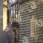 Man making sheet of flowers - Log, colour and B&W