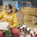 A boy packing roses - Log, colour and B&W