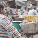 Street vendor selling Pani Puri, - Log, colour and B&W