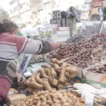 Man selling dates (khajur) - Log, colour and B&W