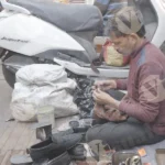 Man polishing shoe on the street - Log, colour and B&W