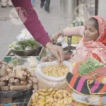 A woman selling dal and spices - Log, colour and B&W