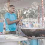 Man making chole bhature ( fried bread or Chickpea) - Log, colour and B&W