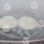 Poori being fried (Indian bread) - Log, colour and B&W