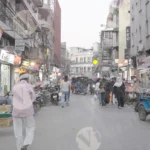 Busy street - Log, colour and B&W