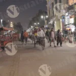 A busy street in chandini chowk (Old Delhi) with several cycle rickshaws - Log, colour and B&W