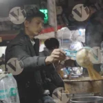Man making tea (chai) - Log, colour and B&W