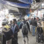 Crowded market scene in Chandni Chowk - Log, colour and B&W