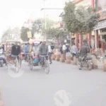 Cycle rickshaws  and pedestrians in chandini chowk market - Log, colour and B&W