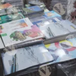 Books on the street - Log, colour and B&W