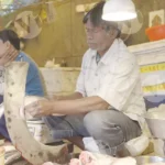 Cutting fish - Log, colour and B&W