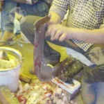 Cutting fish into pieces - Log, colour and B&W