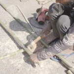 Hammering and drilling a hole in the bamboo - Log, colour and B&W