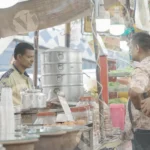 Seller Selling Momos on Street - Log, colour and B&W