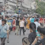 A Crowded Street Market - Log, colour and B&W