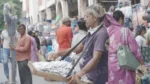 Man Selling Things - Log, colour and B&W