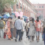 A Man Selling Cotton Candy in Public - Log, colour and B&W