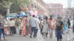 A Man Selling Cotton Candy in Public - Log, colour and B&W