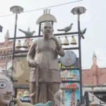 A Statue of a Man - Log, colour and B&W