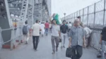People Passing over Howrah Bridge - Log, colour and B&W