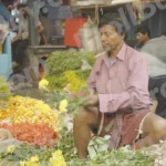 Man Arranging Flowers - Log, colour and B&W